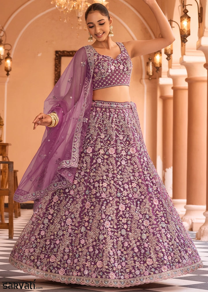 Tacao Purple Embroidered Net Lehenga Choli with Sequins Work