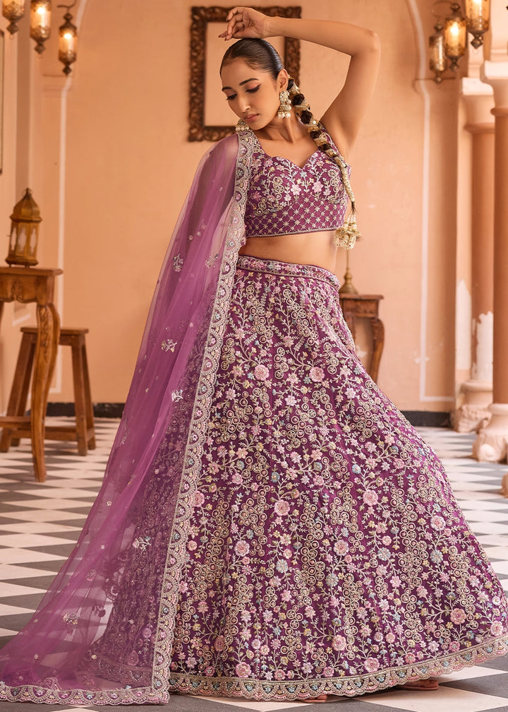Tacao Purple Embroidered Net Lehenga Choli with Sequins Work