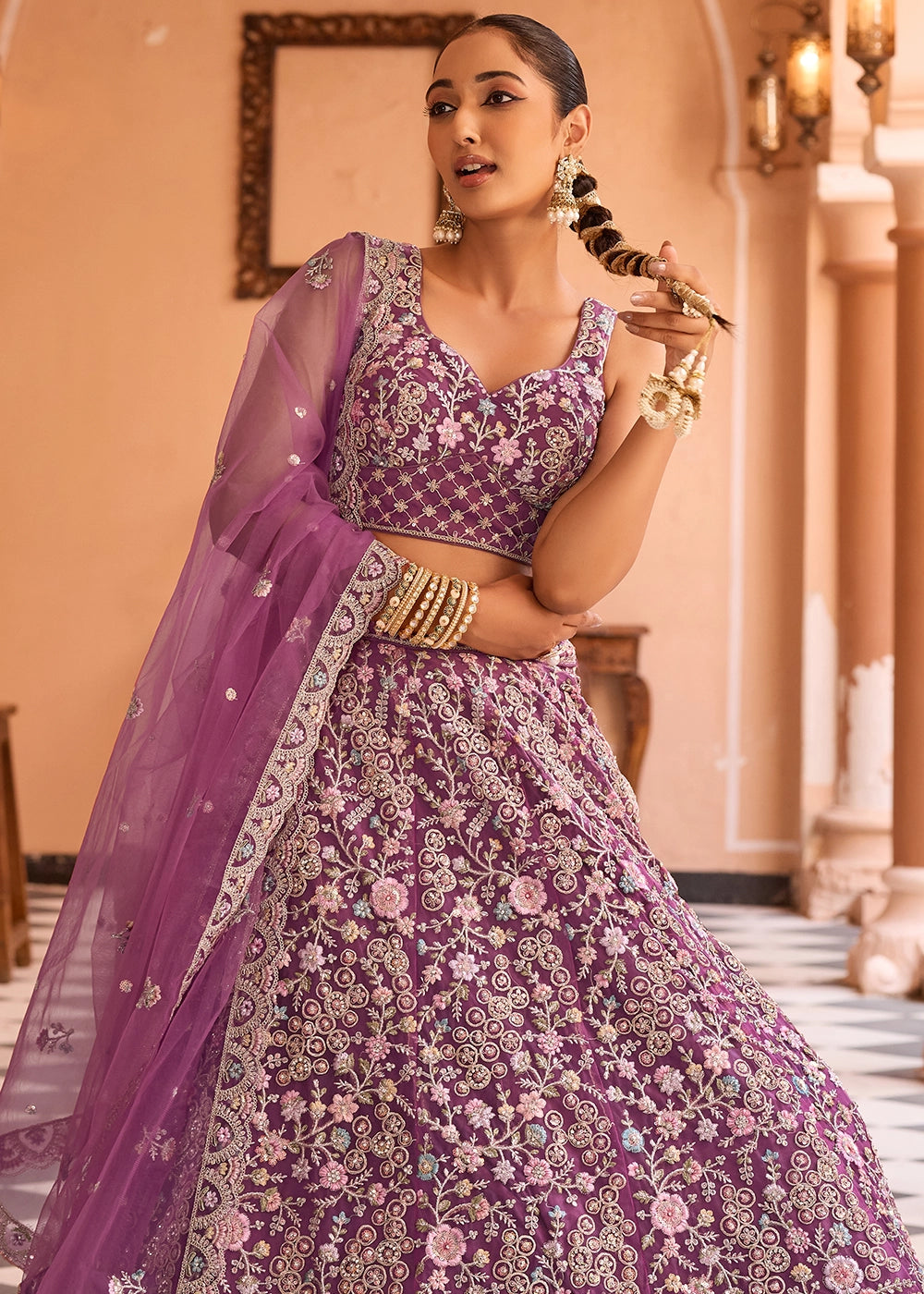 Tacao Purple Embroidered Net Lehenga Choli with Sequins Work