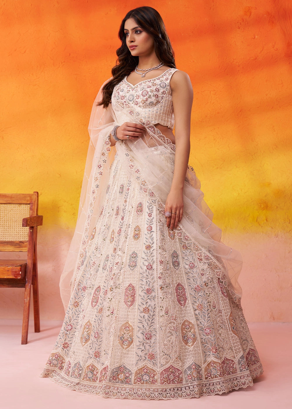 Parchment White Net Embellished Lehenga Choli with Sequins Embroidery