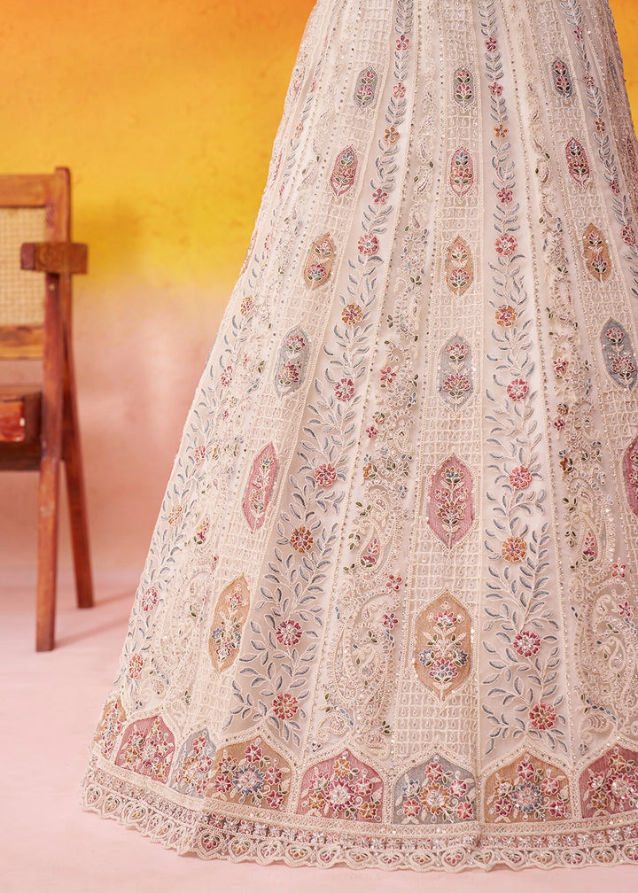 Parchment White Net Embellished Lehenga Choli with Sequins Embroidery