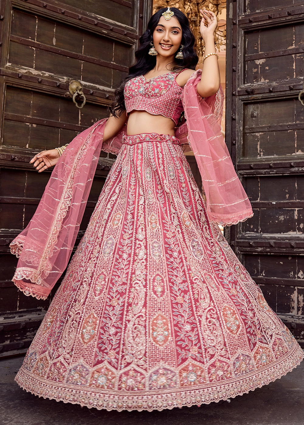 Rouge Pink Embroidered Net Lehenga Choli with Sequins Work