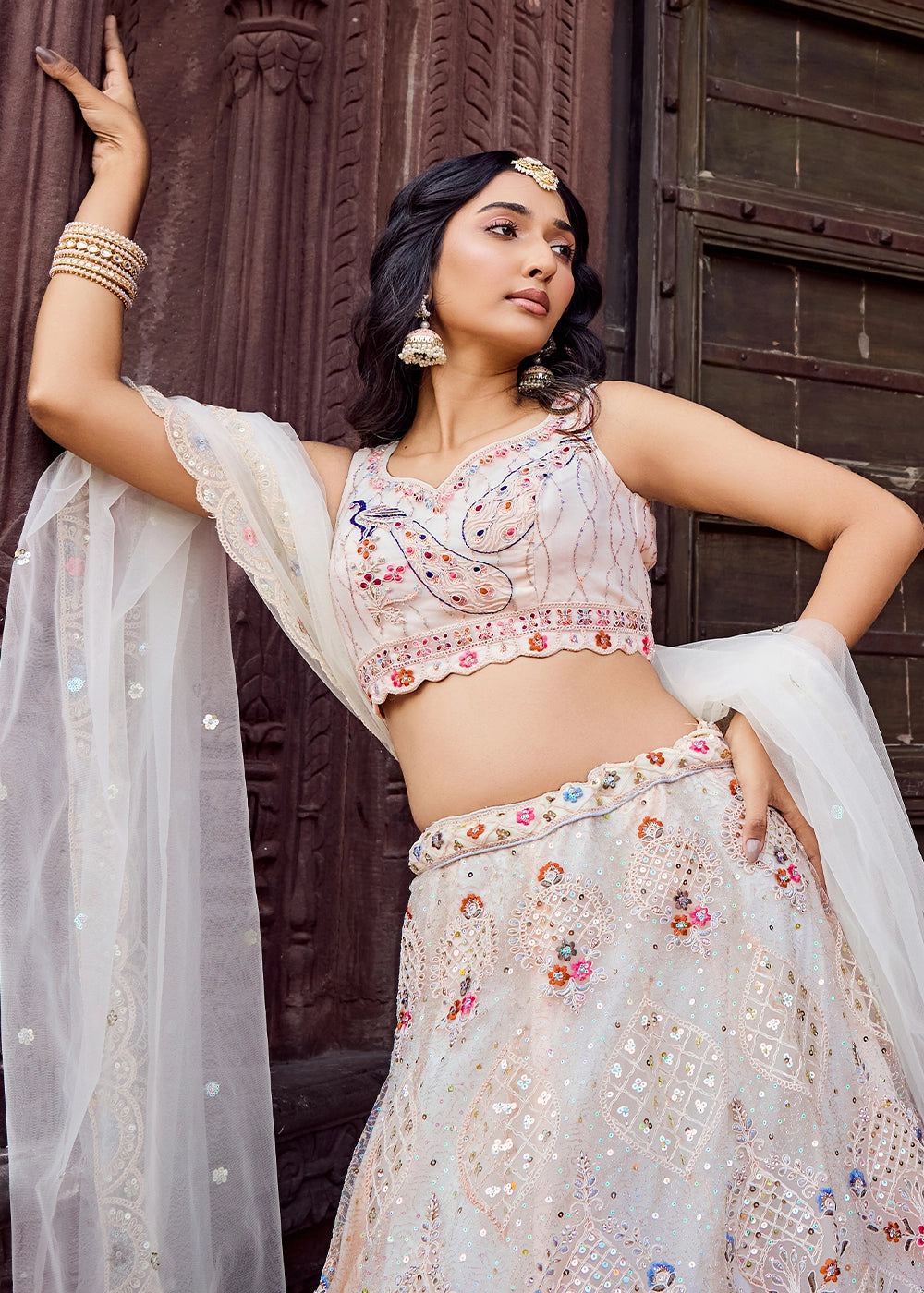 Cream White Embroidered Net Lehenga Choli with Sequins Work