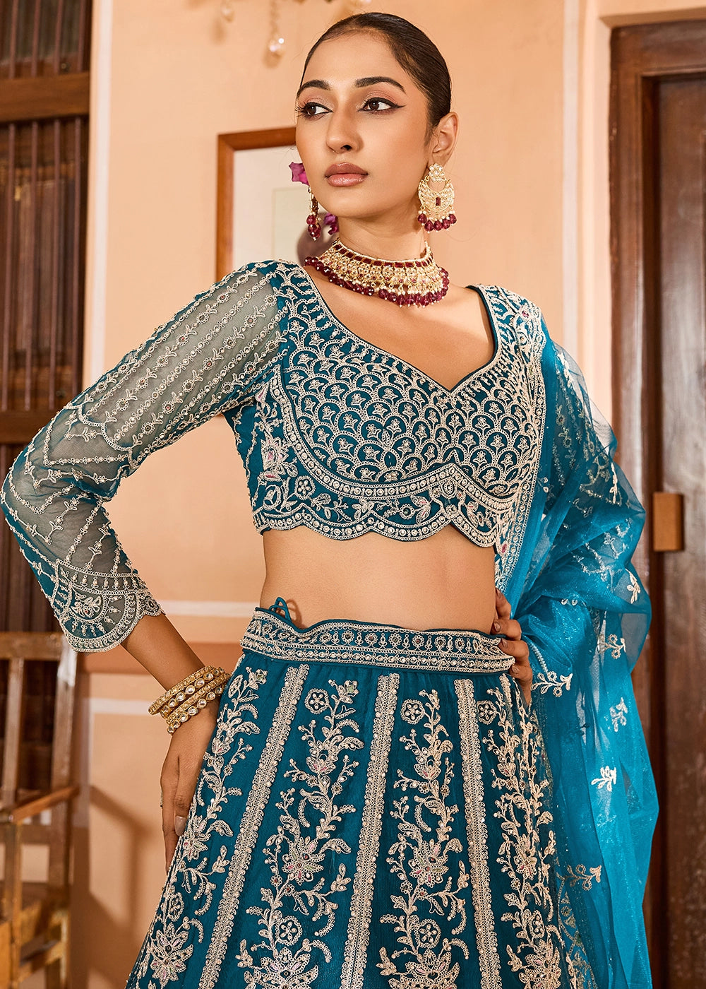 Teal Blue Embroidered Net Lehenga Choli with Sequins Work