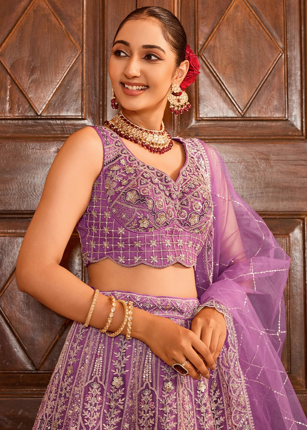 Lilac Purple Embroidered Net Lehenga Choli with Sequins Work