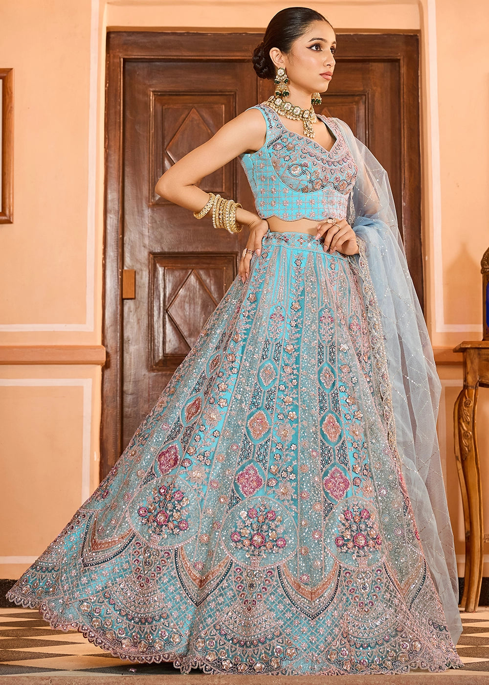 Turquoise Blue Embroidered Net Lehenga Choli with Sequins Work