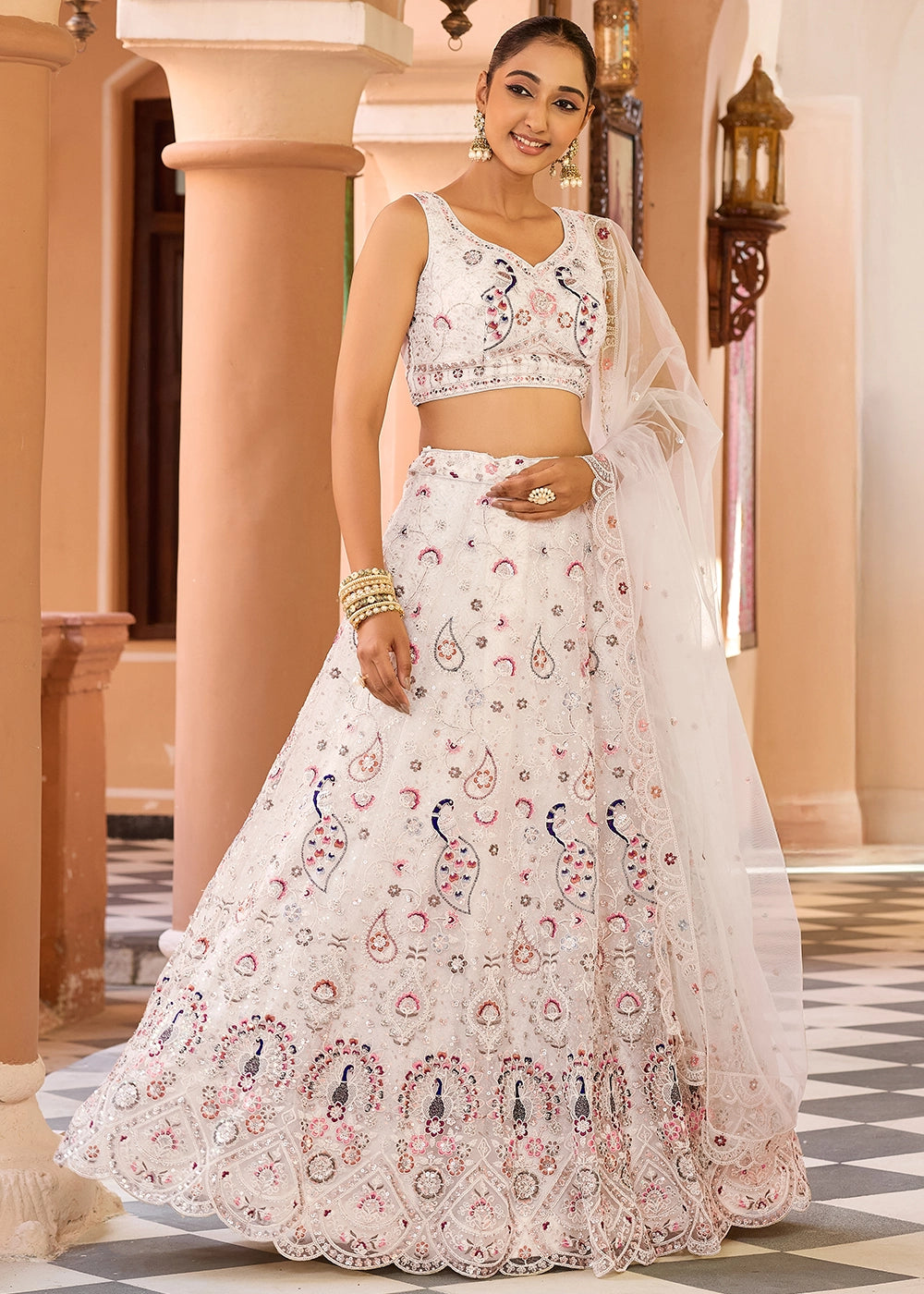 Cream White Embroidered Net Lehenga Choli with Sequins Work