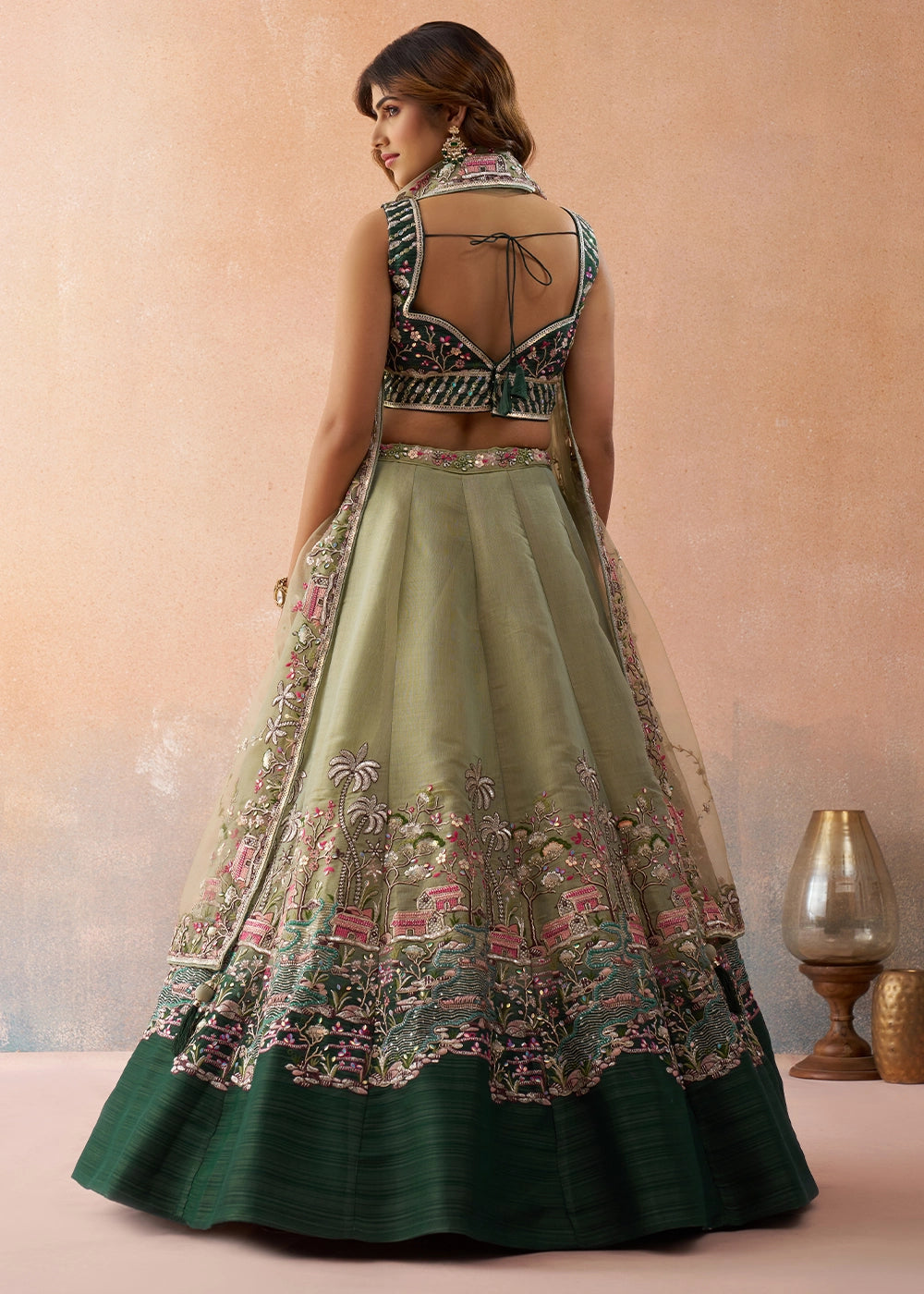Tea Green Net Lehenga Choli with Floral & Sequin Embroidery