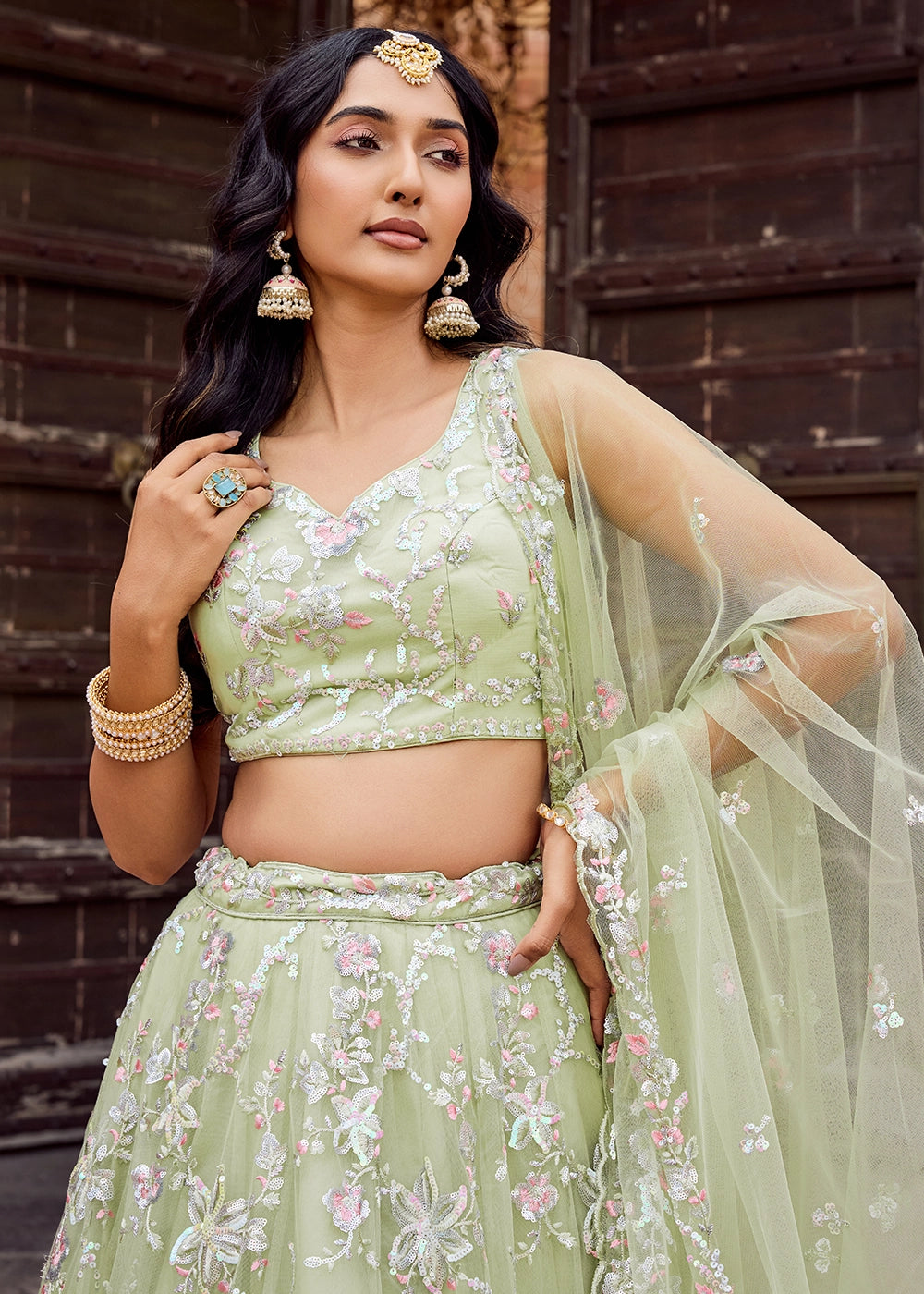 Pear Green Embroidered Net Lehenga Choli with Sequins Work