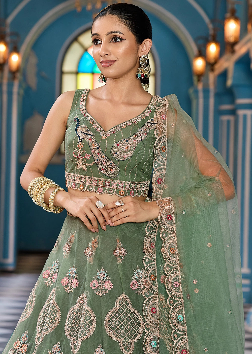 Pickle Green Embroidered Net Lehenga Choli with Sequins Work