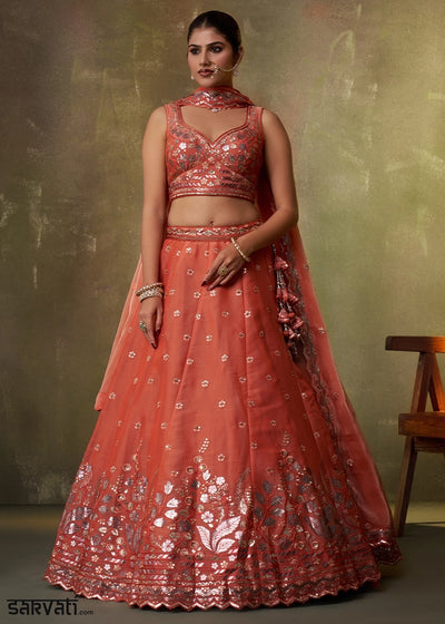 Bright Orange Organza Lehenga Choli with Thread and Sequin Detailing
