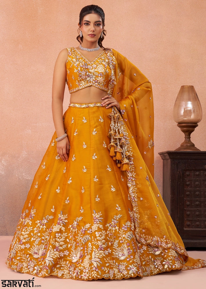 Saffron Orange Tissue Lehenga Choli with Sequin & Zari Detailing