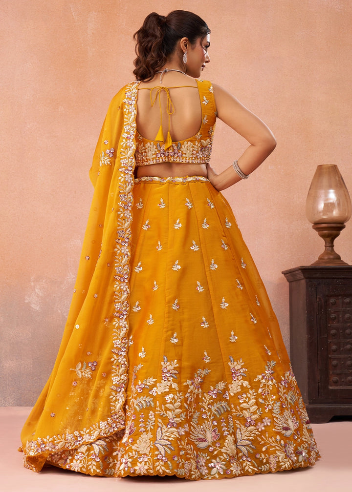 Saffron Orange Tissue Lehenga Choli with Sequin & Zari Detailing