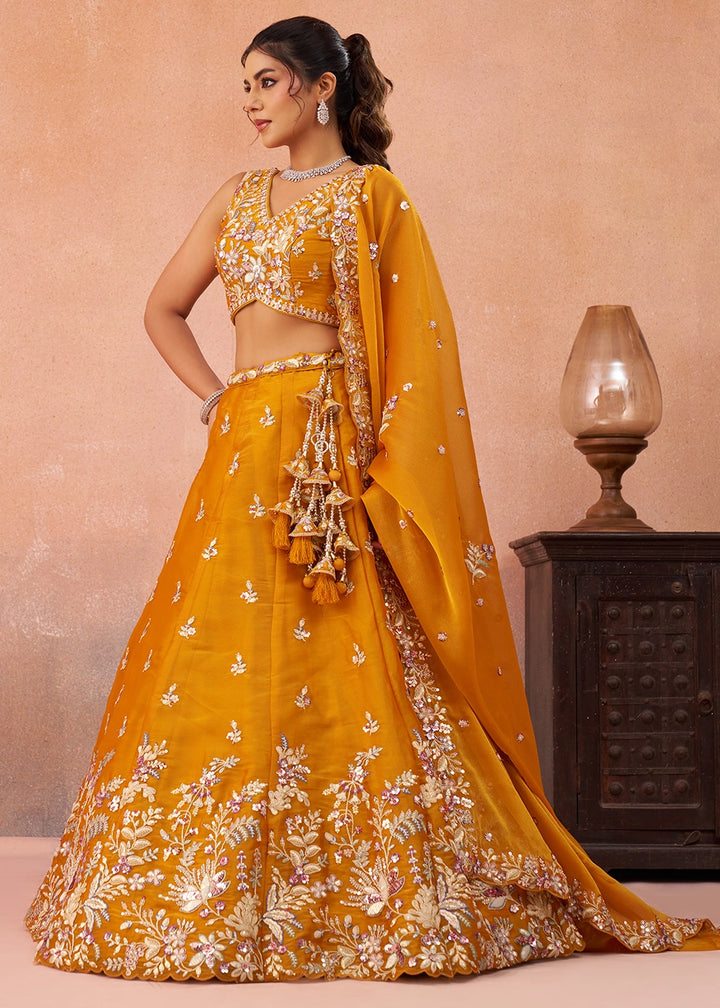 Saffron Orange Tissue Lehenga Choli with Sequin & Zari Detailing