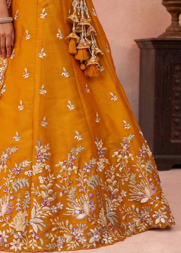 Saffron Orange Tissue Lehenga Choli with Sequin & Zari Detailing
