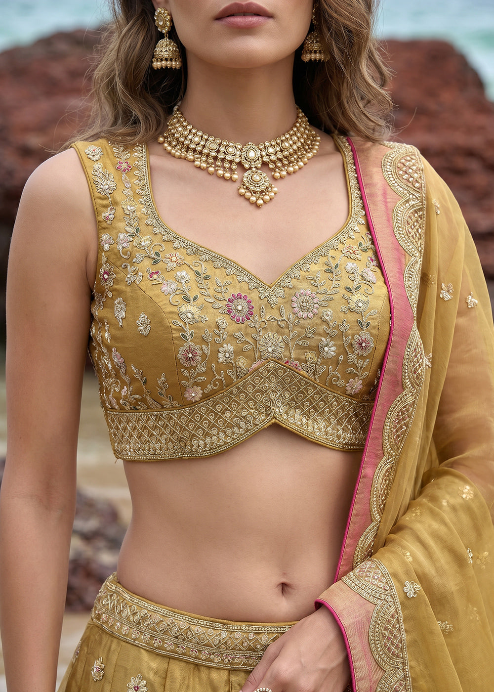 Antique Gold Yellow Tissue Lehenga Choli with Pearl and Zari Embroidered Motifs
