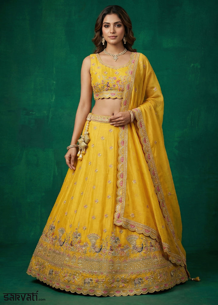 Marigold Yellow Tissue Lehenga Choli with Zarkan, Jharokha &amp; Peacock Motif Embroidery