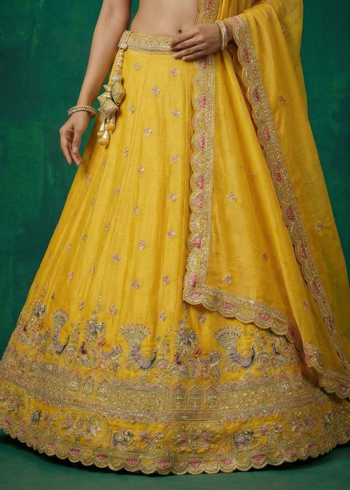 Marigold Yellow Tissue Lehenga Choli with Zarkan, Jharokha &amp; Peacock Motif Embroidery