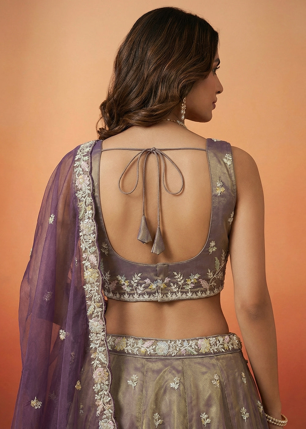 Tones of Purple Tissue Lehenga Choli with Heavy Zari & Thread Embroidery