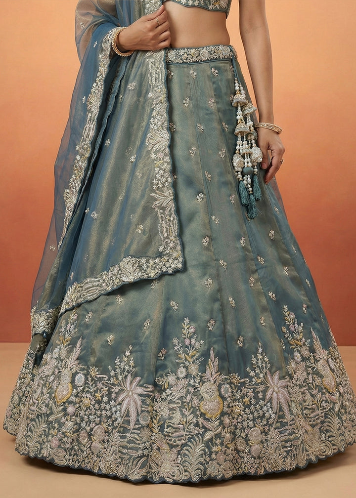 Deep Peacock Blue Tissue Lehenga Choli with Gold Shimmer, Moti, Zari &amp; Floral Embroidery