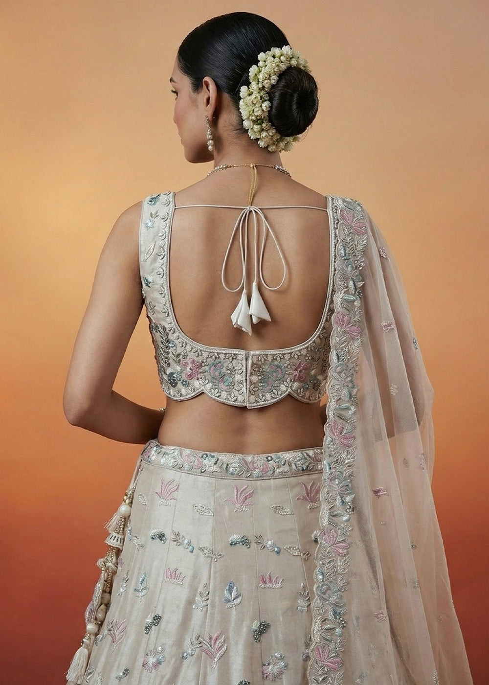 Champagne Beige Organza Lehenga Choli with Heavy Threadwork, Swarovski & Sequin Embroidery
