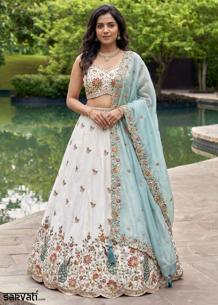 Ivory White Organza Lehenga Choli with Powder Blue Dupatta, Zari, Thread &amp; Peacock Embroidery
