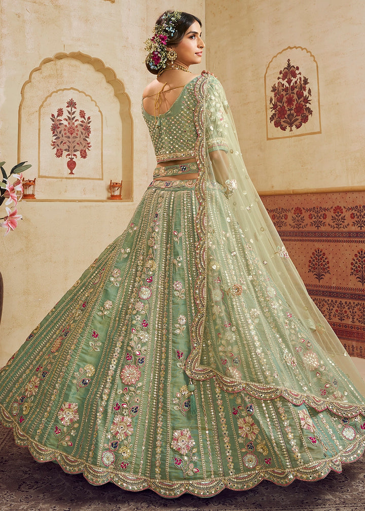 Celadon Green Net Lehenga Choli with Floral Embroidery & Sequins work
