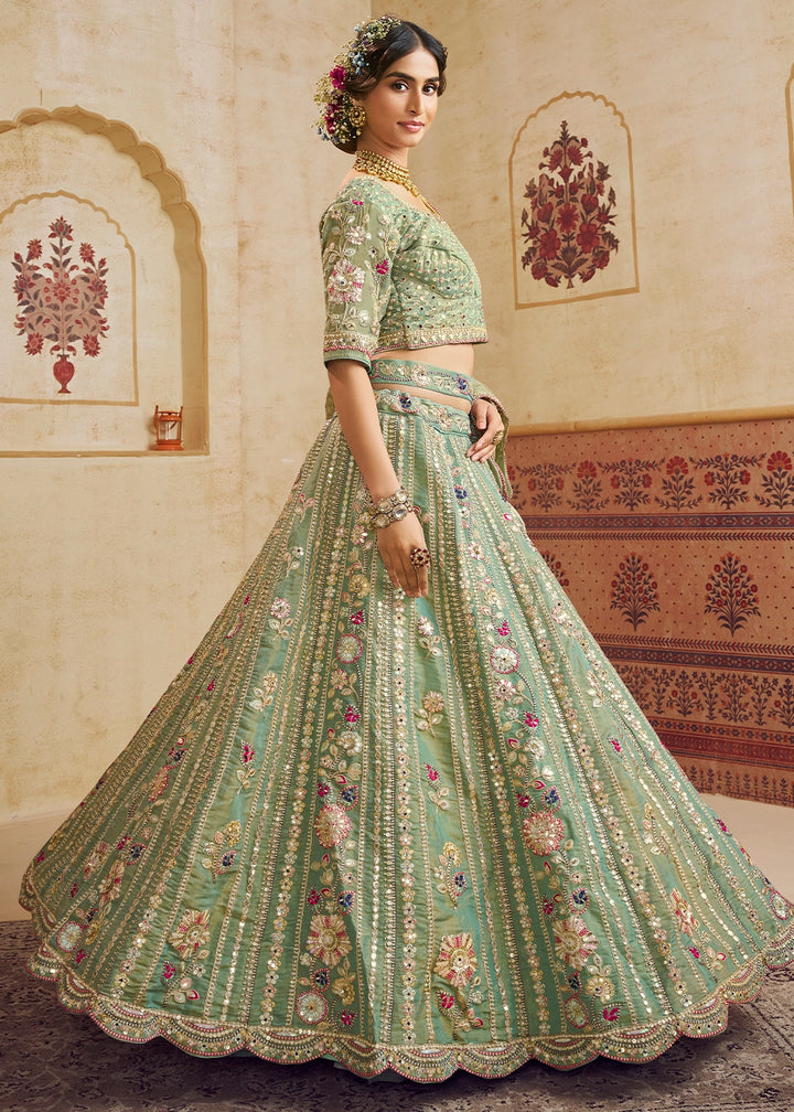Celadon Green Net Lehenga Choli with Floral Embroidery & Sequins work