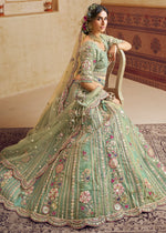 Celadon Green Net Lehenga Choli with Floral Embroidery & Sequins work