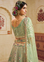 Celadon Green Net Lehenga Choli with Floral Embroidery & Sequins work
