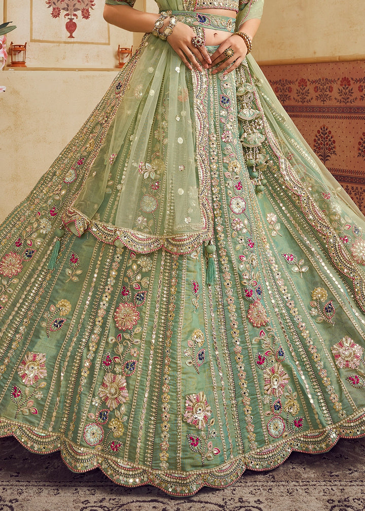Celadon Green Net Lehenga Choli with Floral Embroidery & Sequins work
