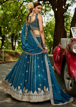 Azure Blue Lehenga Choli in Georgette with Floral & Sequin Embroidery