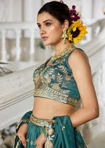 Teal Green Lehenga Choli in Georgette with Floral & Sequin Embroidery