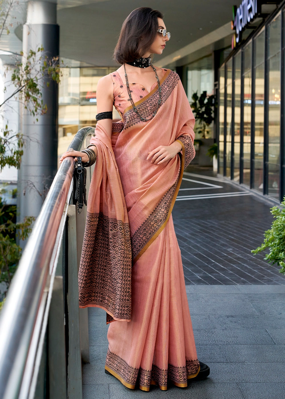 Melon Pink Tissue Linen Saree with Subtle Woven Border