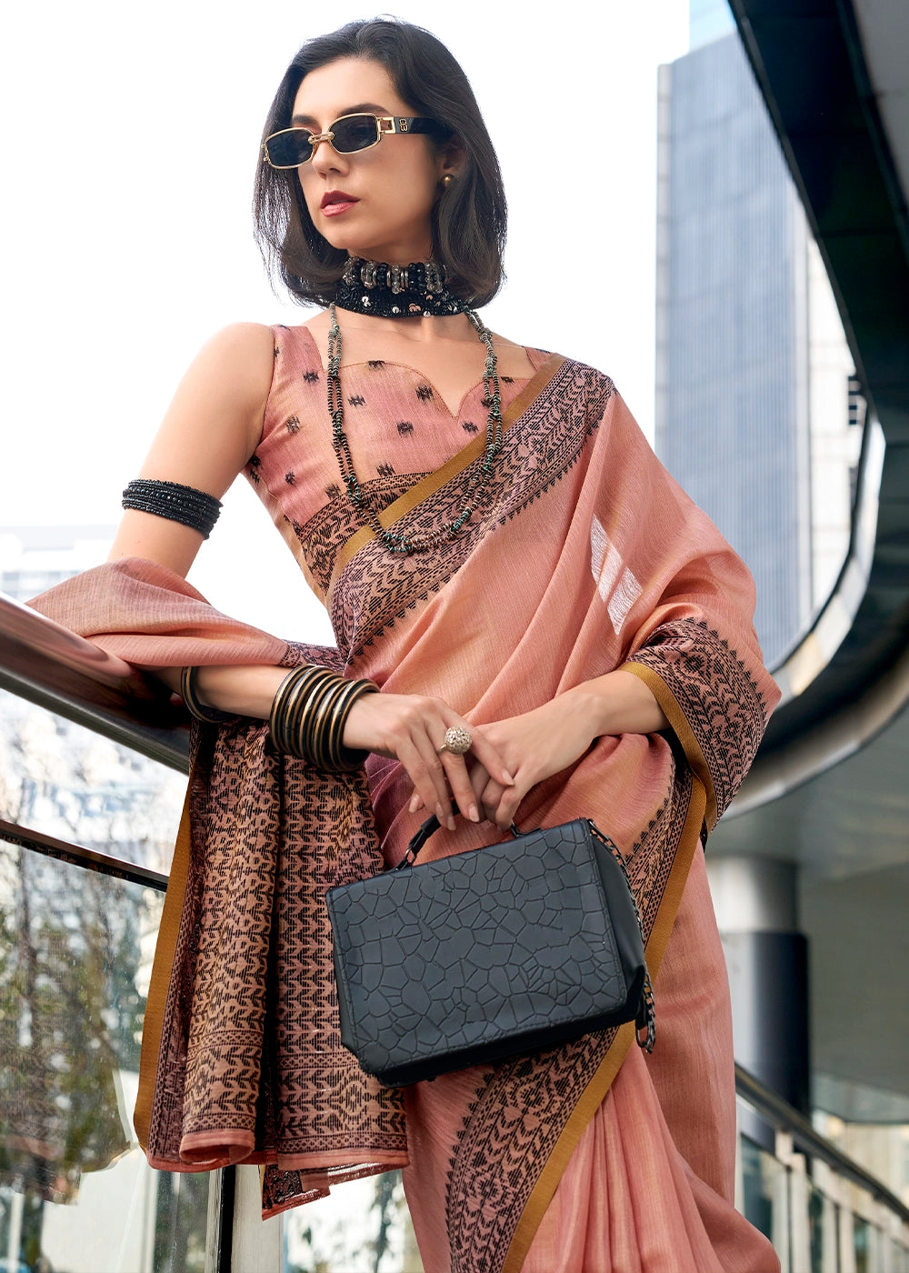 Melon Pink Tissue Linen Saree with Subtle Woven Border