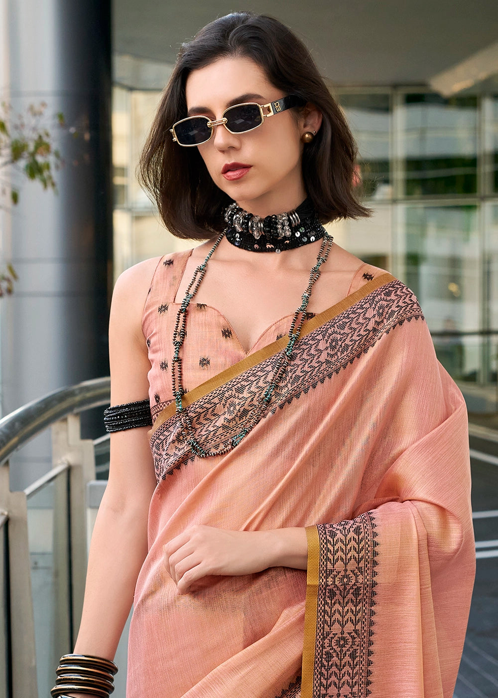 Melon Pink Tissue Linen Saree with Subtle Woven Border