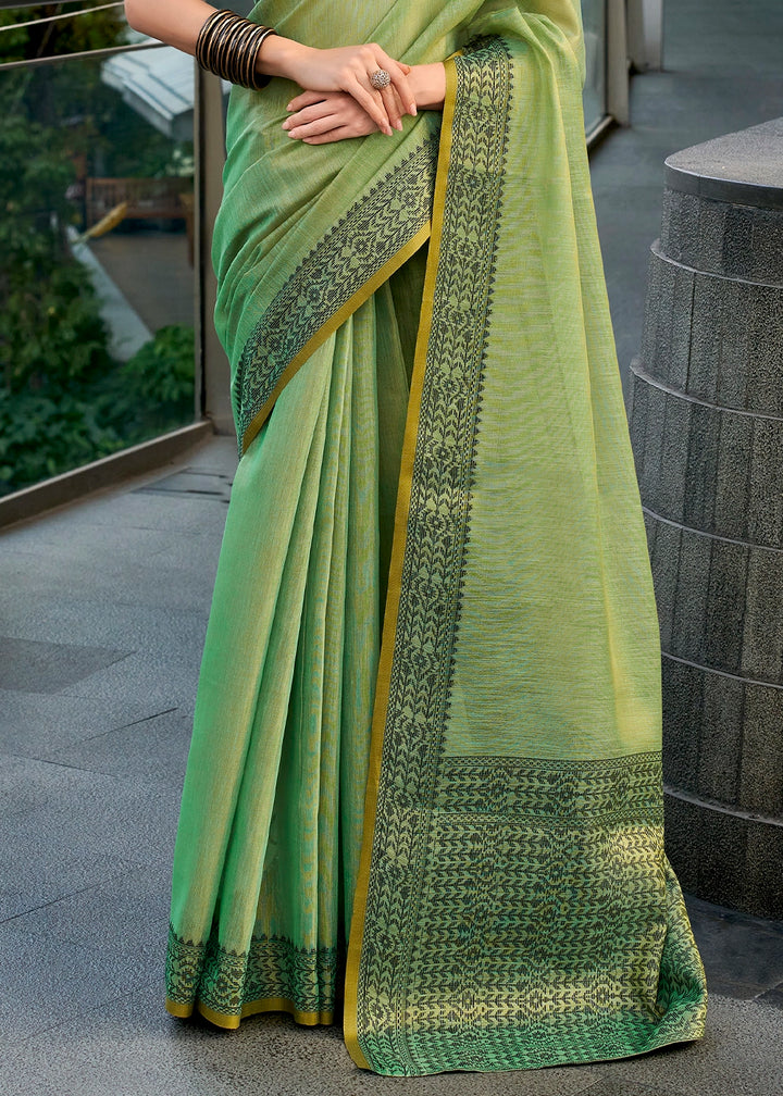 Cool Green Tissue Linen Saree with Subtle Woven Border