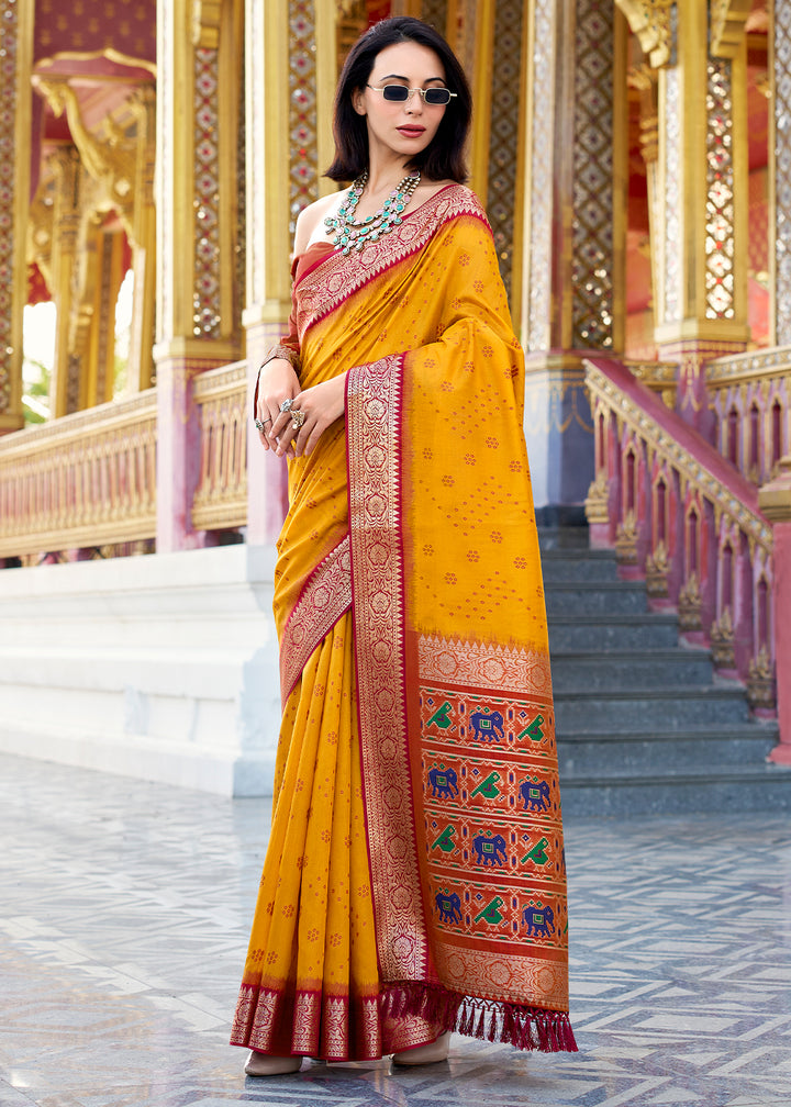 Saffron Yellow Tussar Silk Saree with Exquisite Zari Border & Patola Pallu