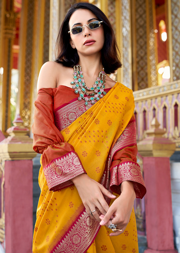 Saffron Yellow Tussar Silk Saree with Exquisite Zari Border & Patola Pallu