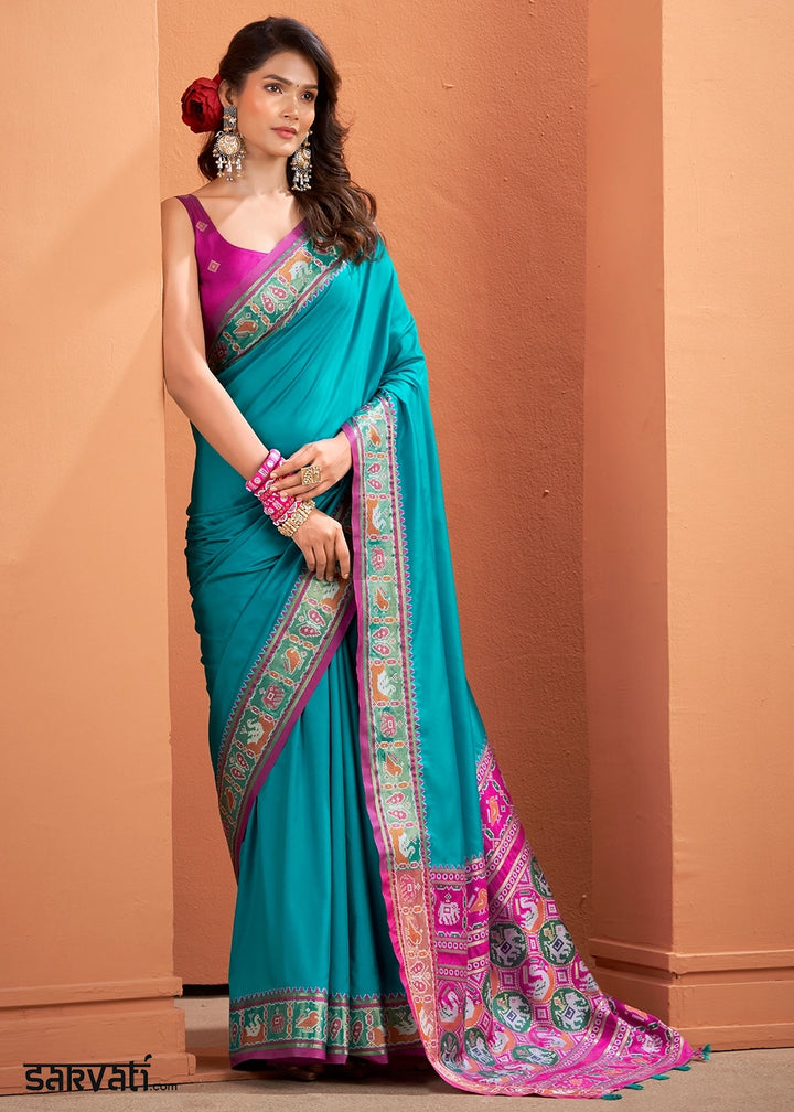 Cerulean Blue Patola Silk Saree with Contrast Border & Pallu