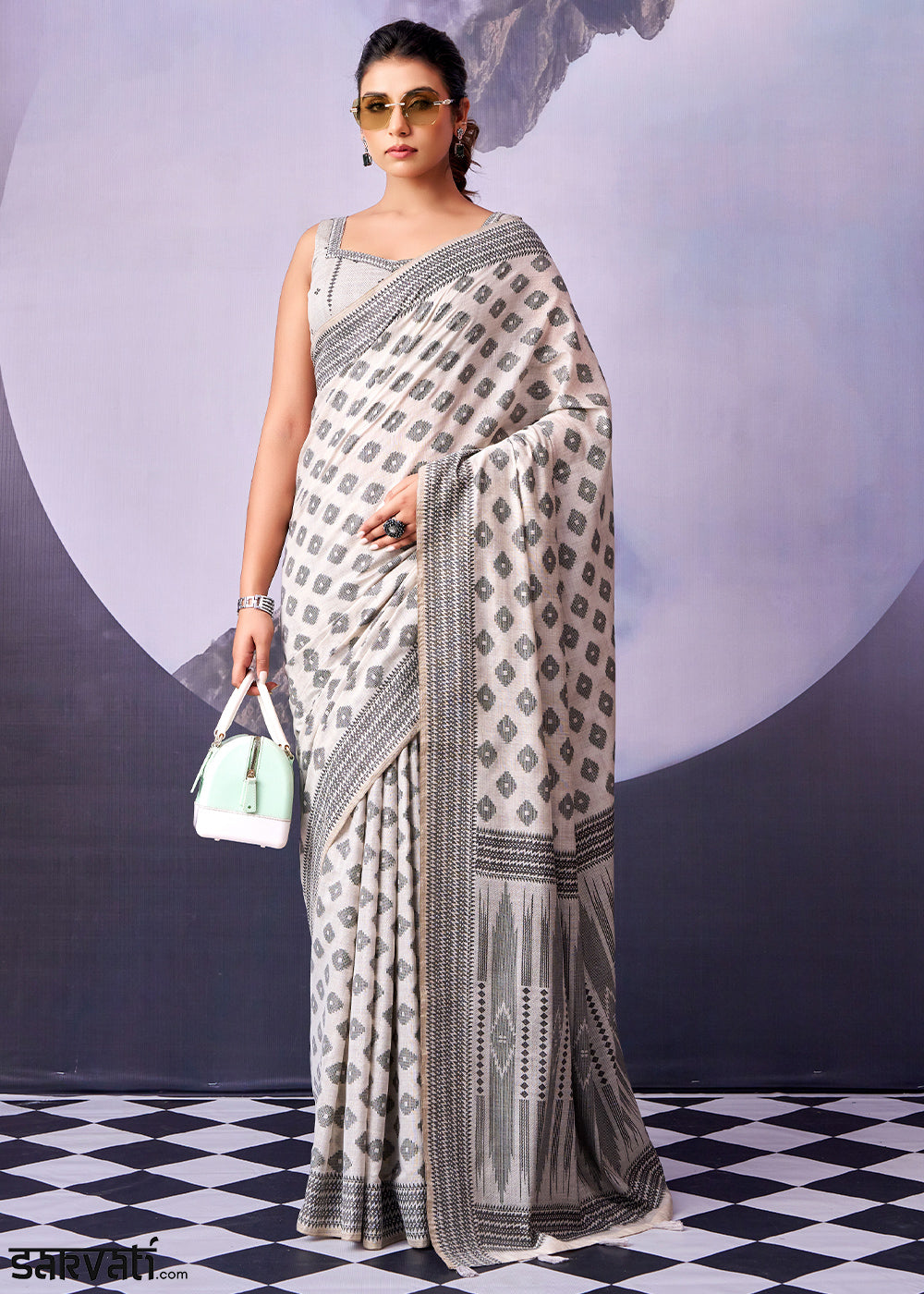 Floral White Cotton Saree with Contemporary Artistic Patterns