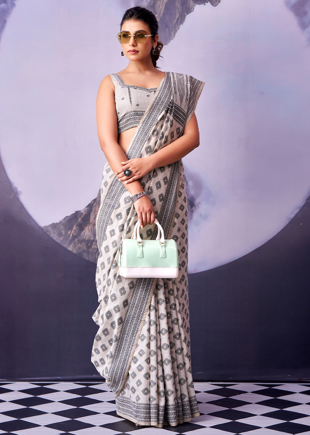 Floral White Cotton Saree with Contemporary Artistic Patterns