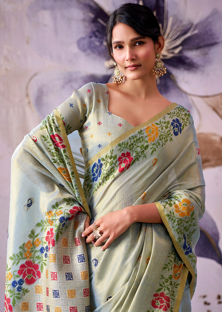Tones of Blue Tissue Silk Saree with Intricate Floral Zari Motifs
