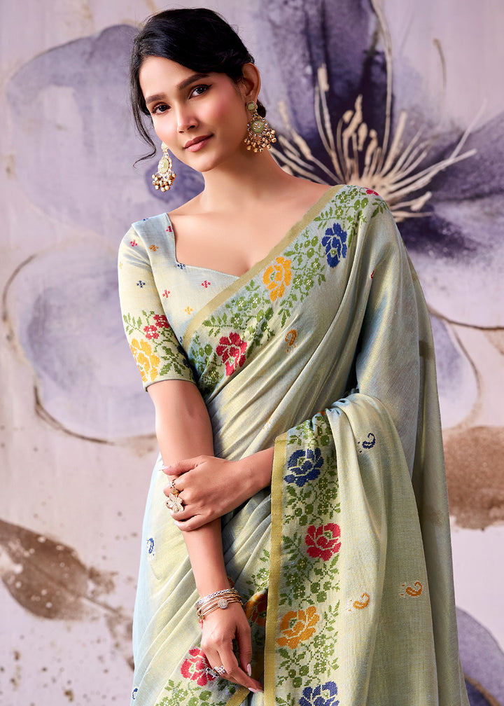 Tones of Blue Tissue Silk Saree with Intricate Floral Zari Motifs