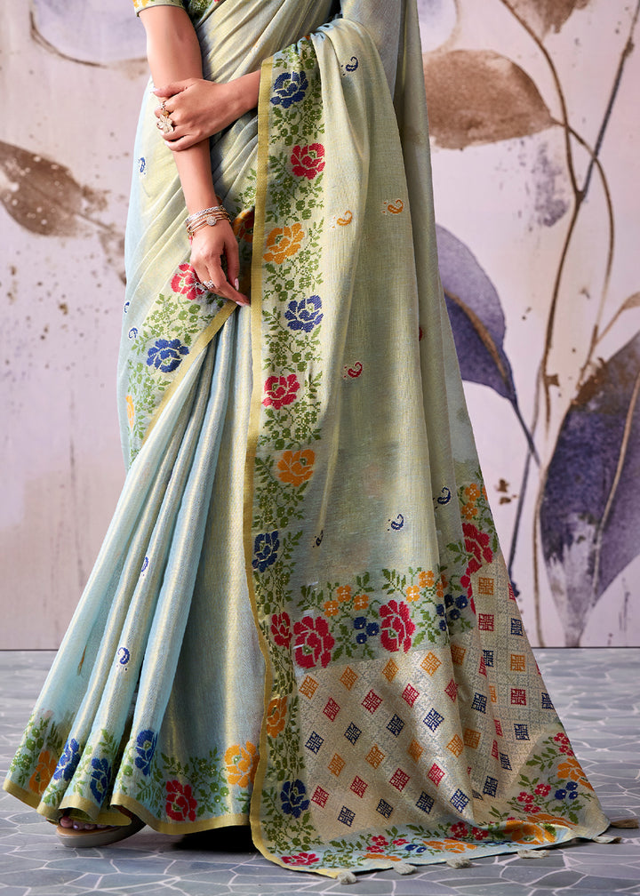 Tones of Blue Tissue Silk Saree with Intricate Floral Zari Motifs
