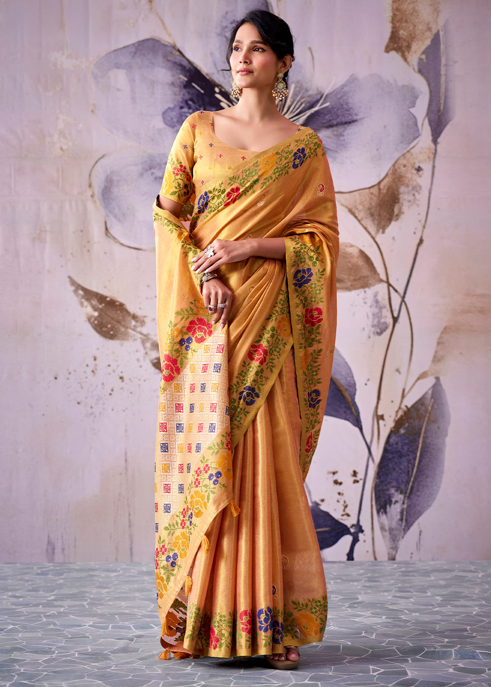 Tones of Orange Tissue Silk Saree with Intricate Floral Zari Motifs