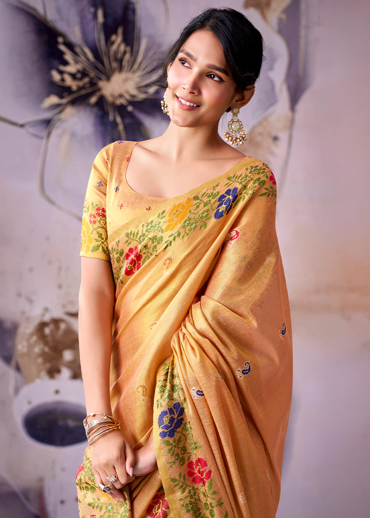 Tones of Orange Tissue Silk Saree with Intricate Floral Zari Motifs