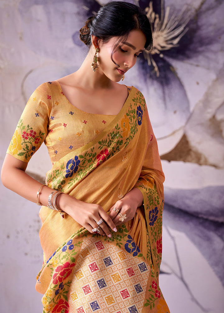 Tones of Orange Tissue Silk Saree with Intricate Floral Zari Motifs