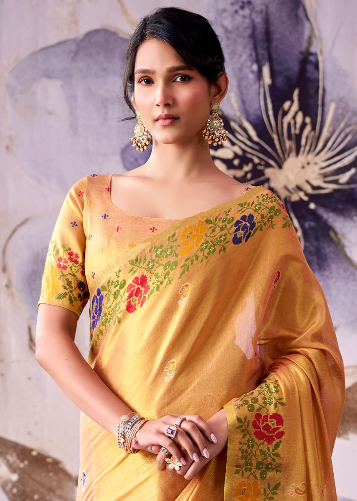 Tones of Orange Tissue Silk Saree with Intricate Floral Zari Motifs