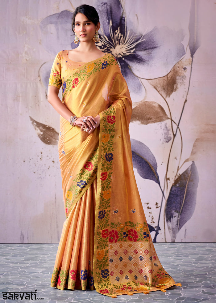 Tones of Orange Tissue Silk Saree with Intricate Floral Zari Motifs